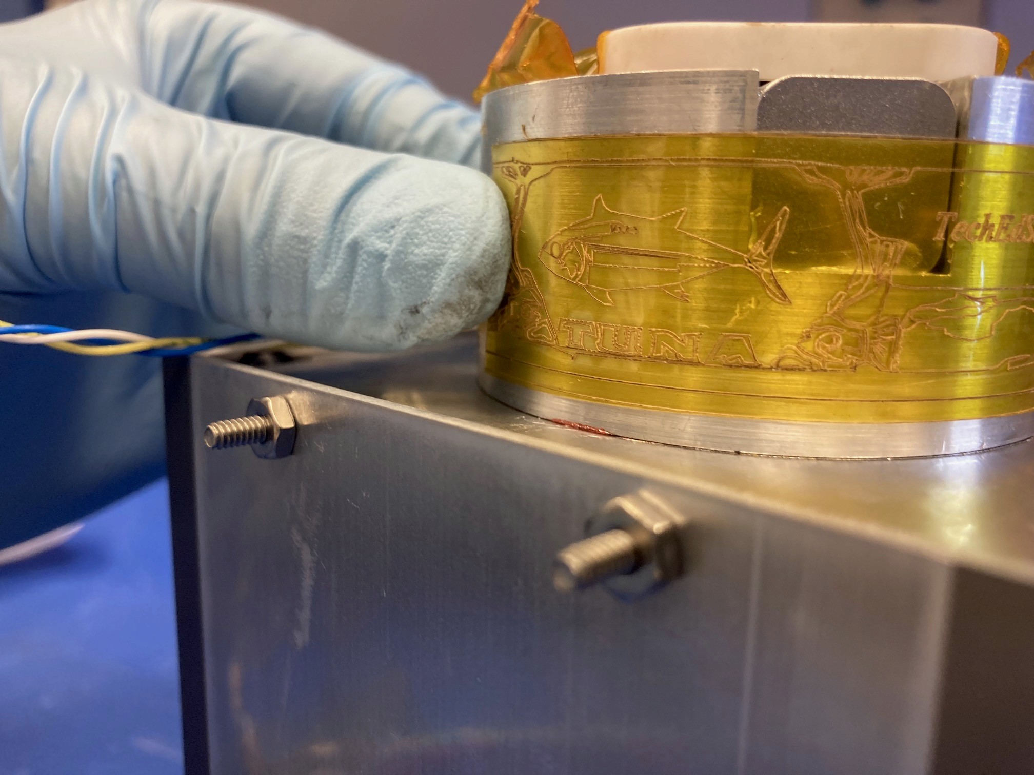 application of tuna label to satellite