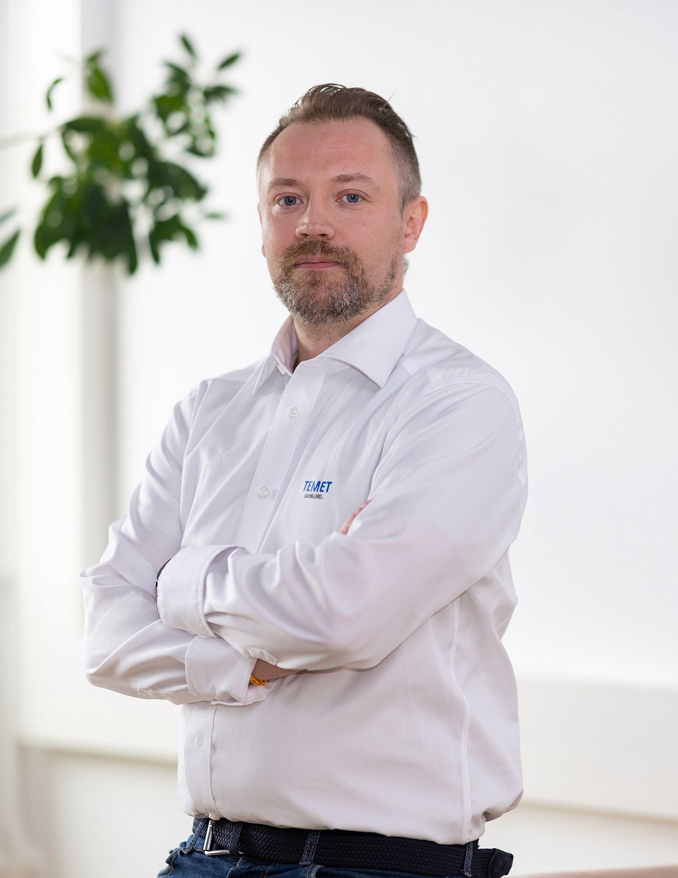 Portrait of John Doe Anderson, CEO of Omnis.