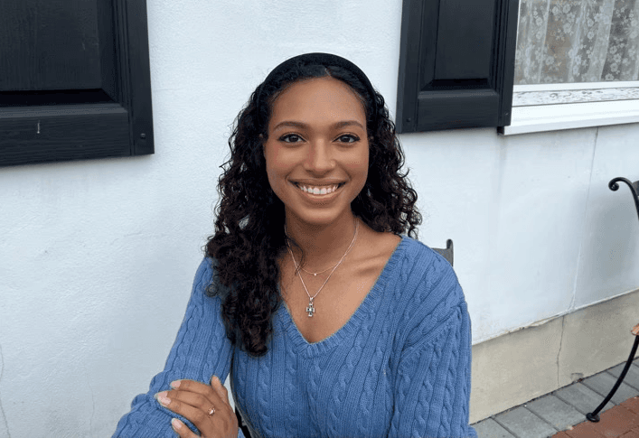 A young girl smiling