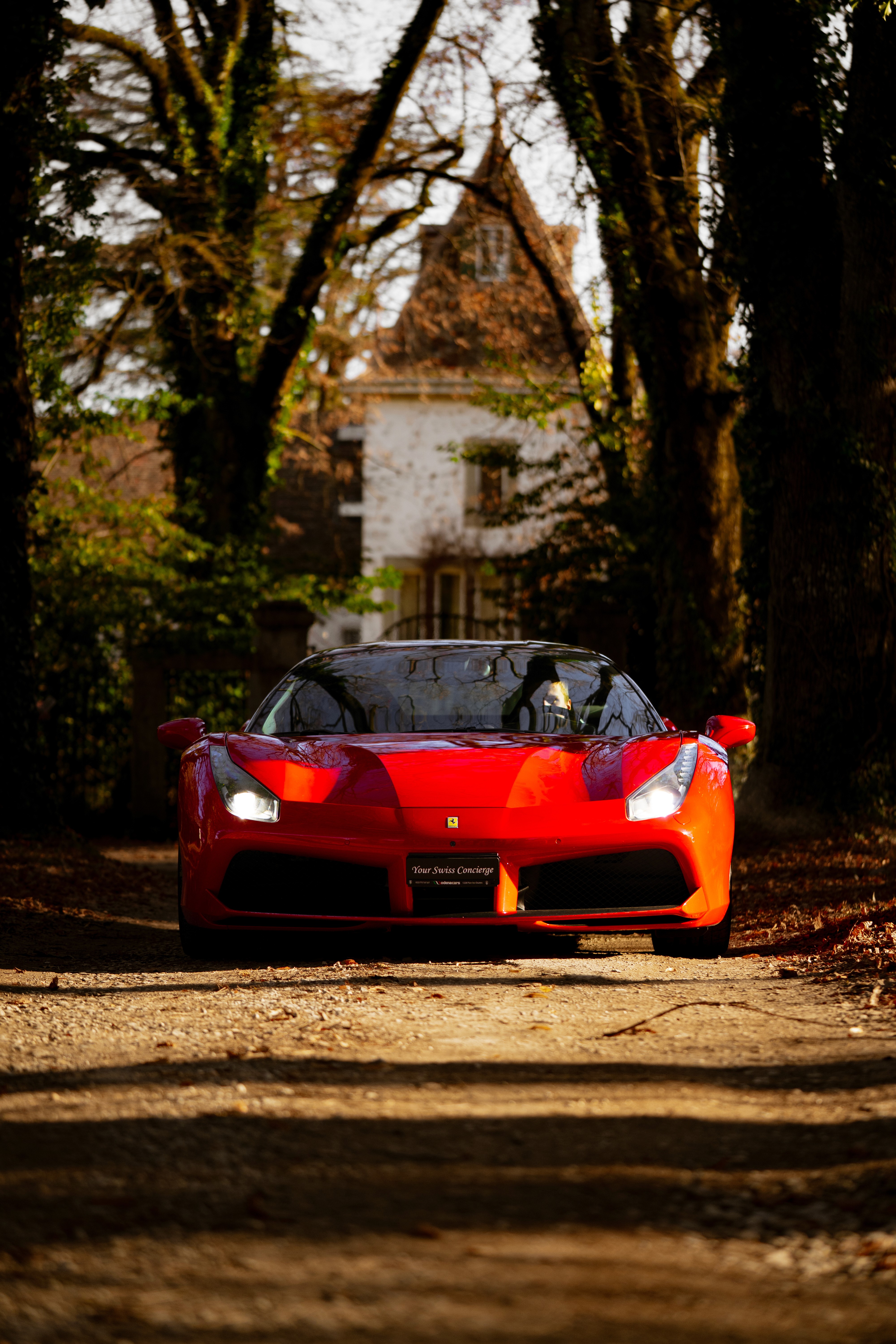 Ferrari riding out of castle