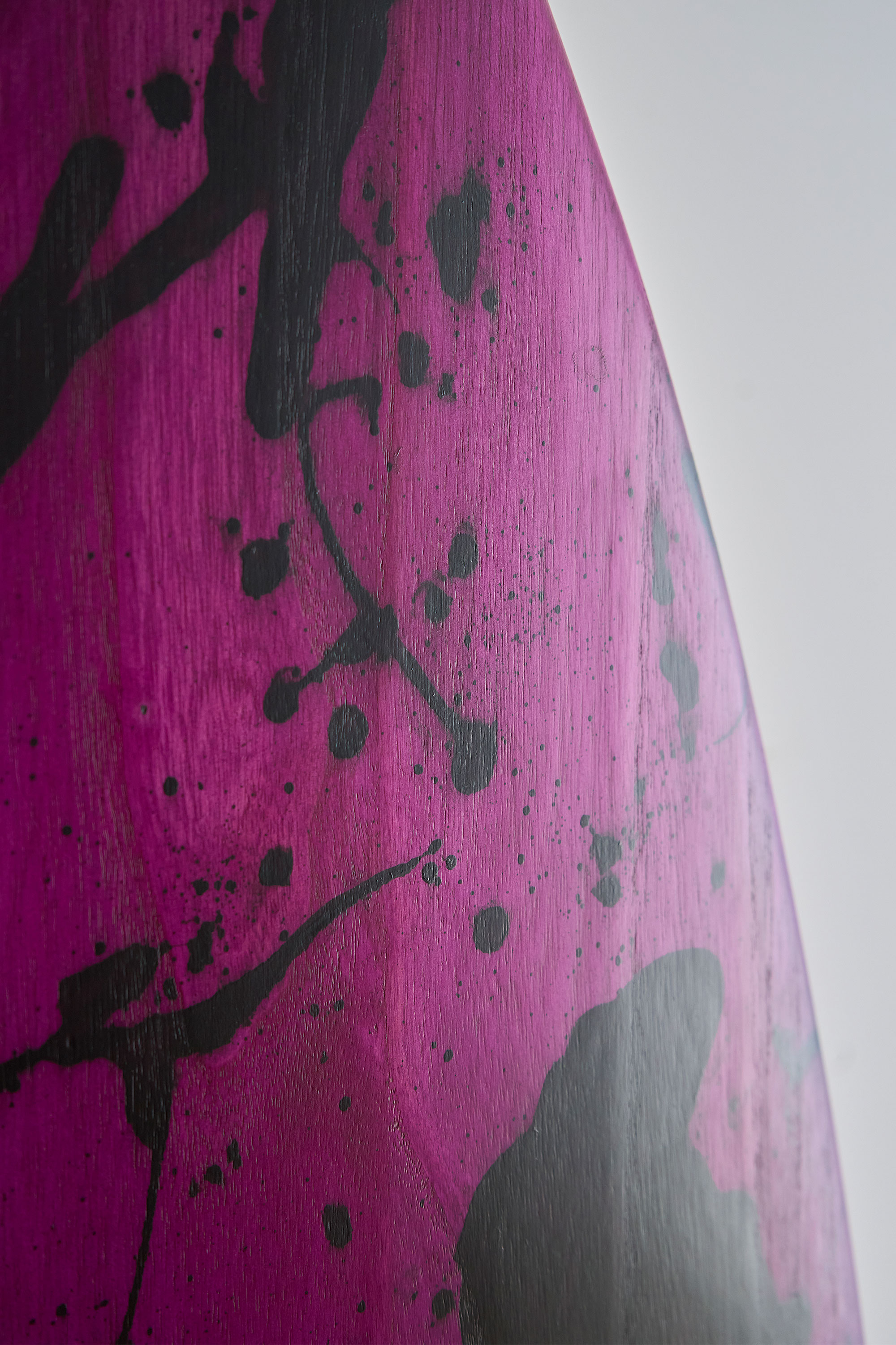 Purple and black surfboard art