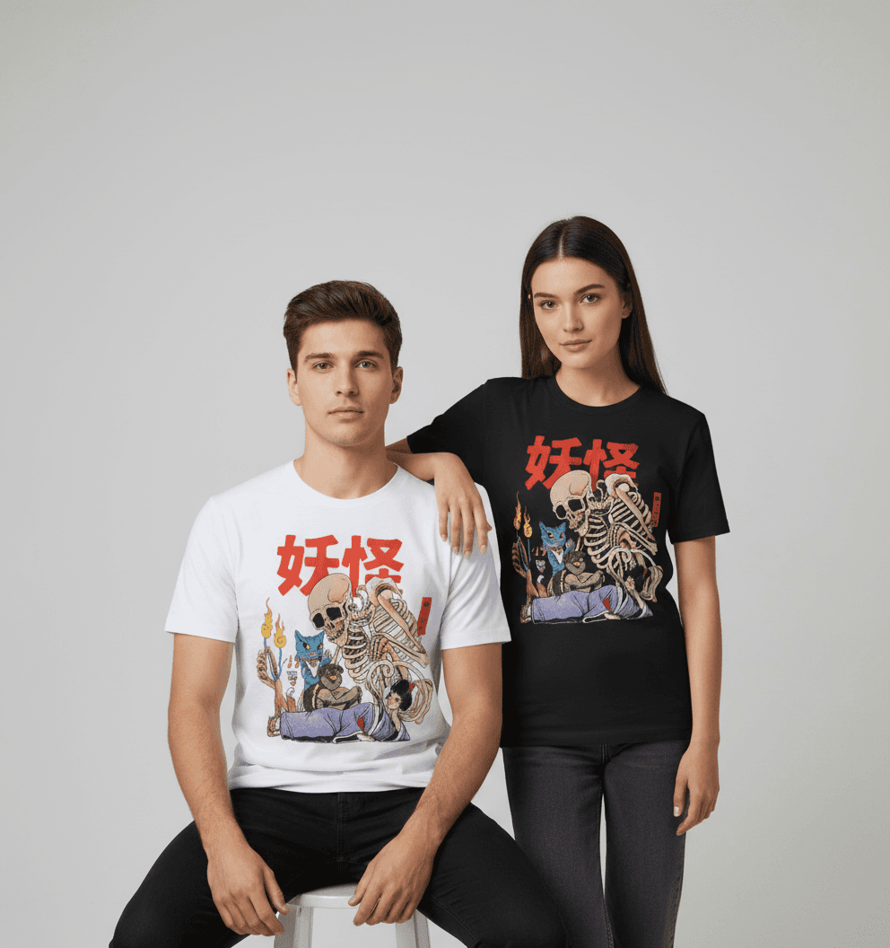 Woman and man wearing the same graphic t-shirt in a grey studio