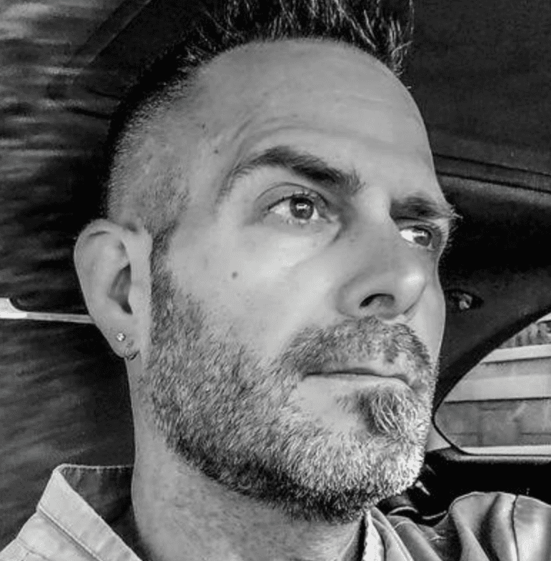 husband and wife working happily on a laptop