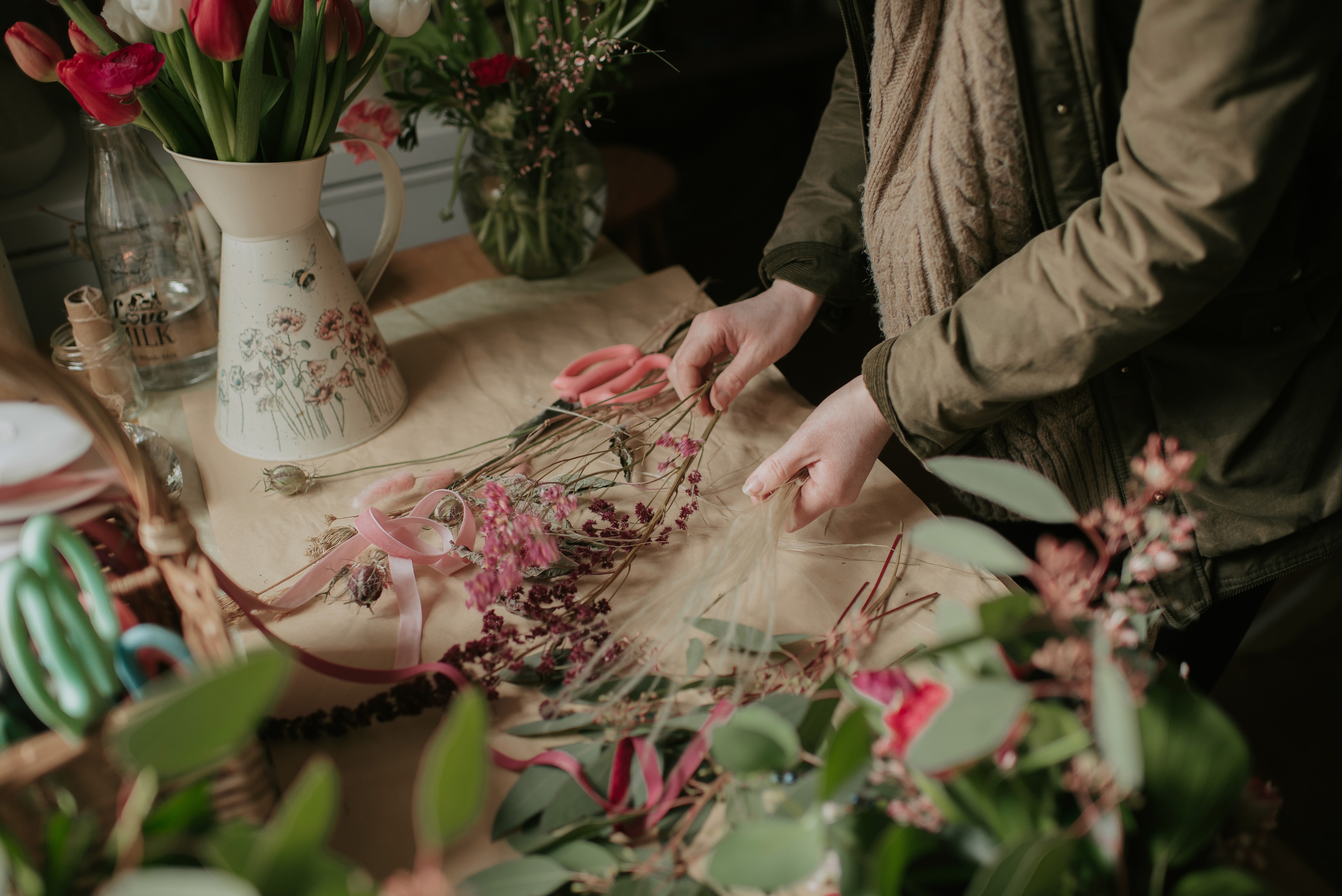 green chairs under umbrellas on shore