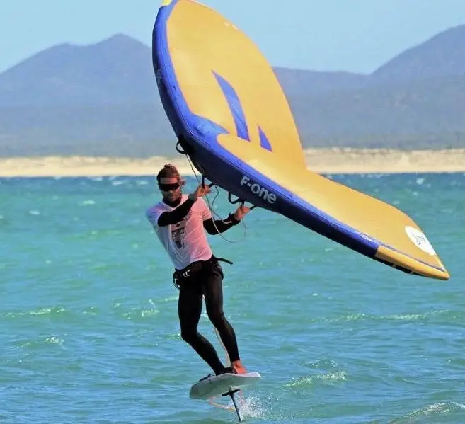 Group of men surfing