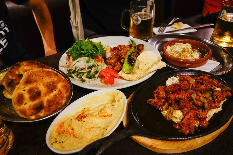 A table laid with eastern Mediterranean dishes