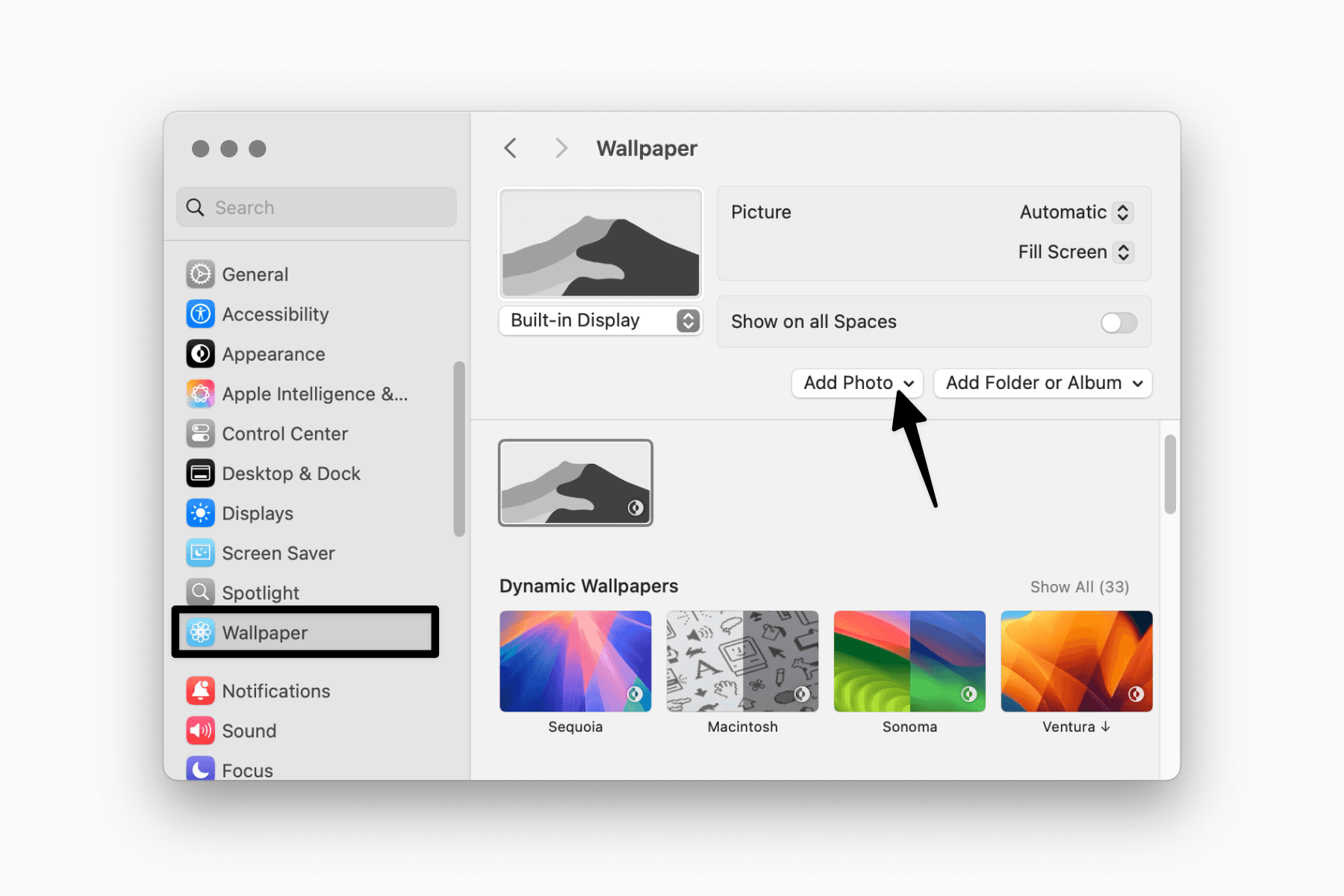 Setting a custom wallpaper in the system settings on macOS