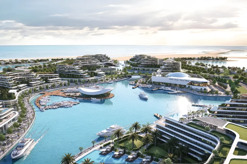 A vibrant image of Delphine Beach resort in Dubai, highlighting the sandy beach, turquoise water, and tropical surroundings.