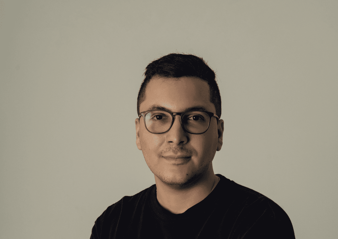 A portrait of a young man smiling