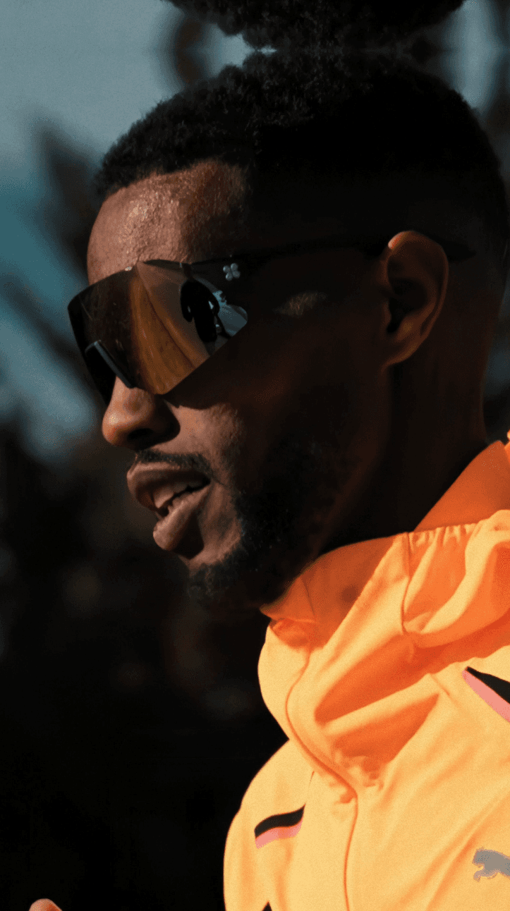 Close-up of bride and groom's torsos, bride in white dress
