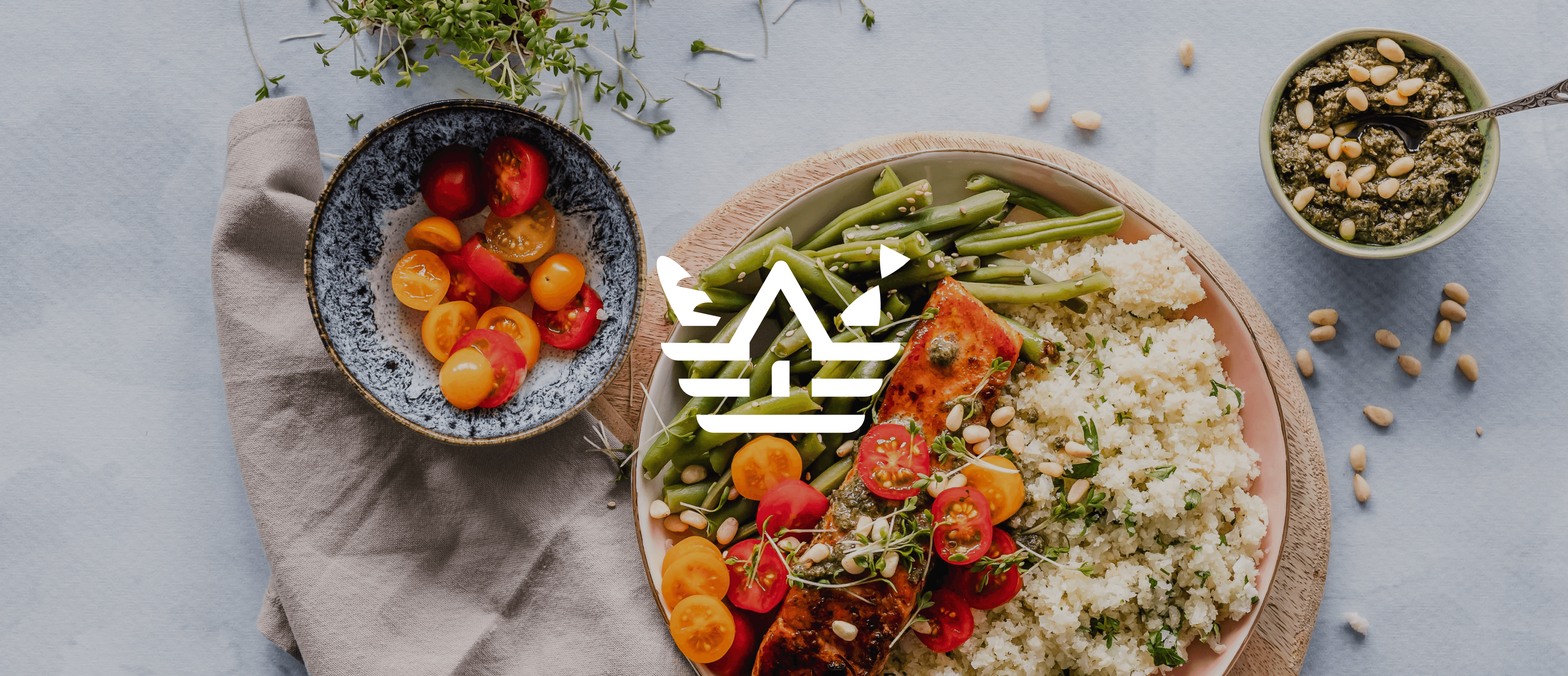 Dinner spread with salmon, rice, and veggies