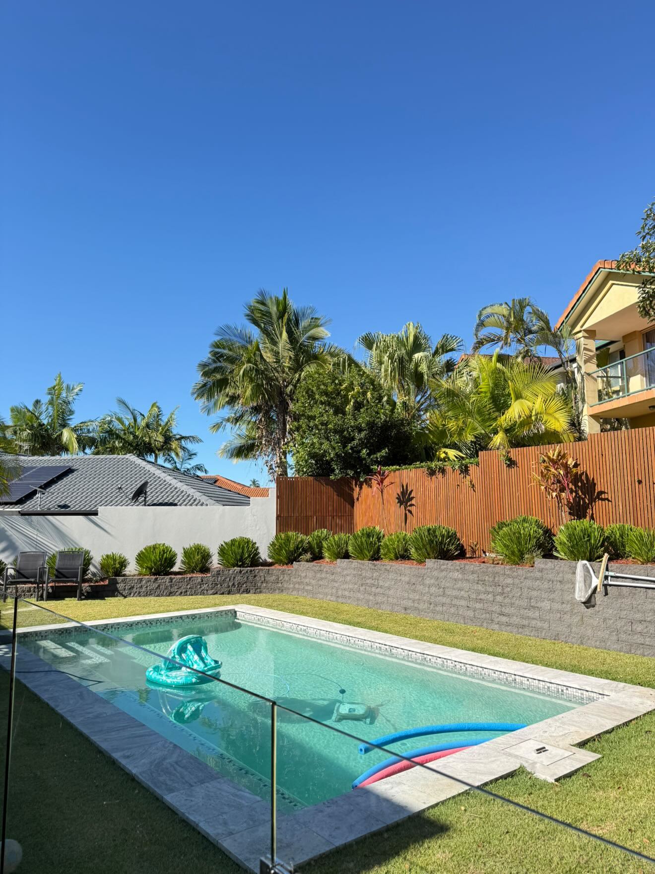 Hedge trimming pruning and garden maintenance residential pool area Gold Coast by Hepburn Property Maintenance