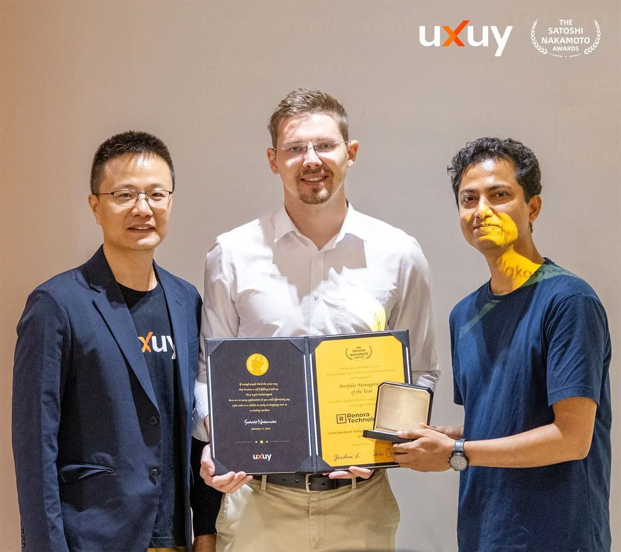 Satoshi Nakamoto Award certificate and gold medal awarded to Renora Technologies for Portfolio Management of the Year, signed in Singapore, September 2023