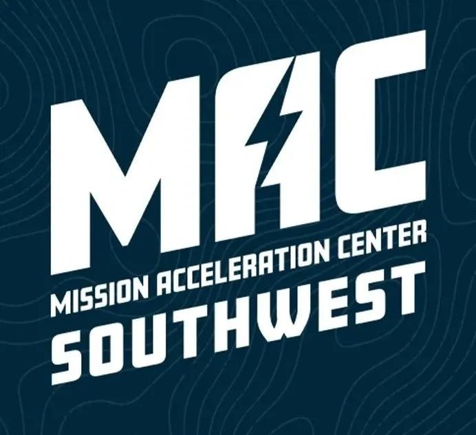 a black and white living room with a large tv