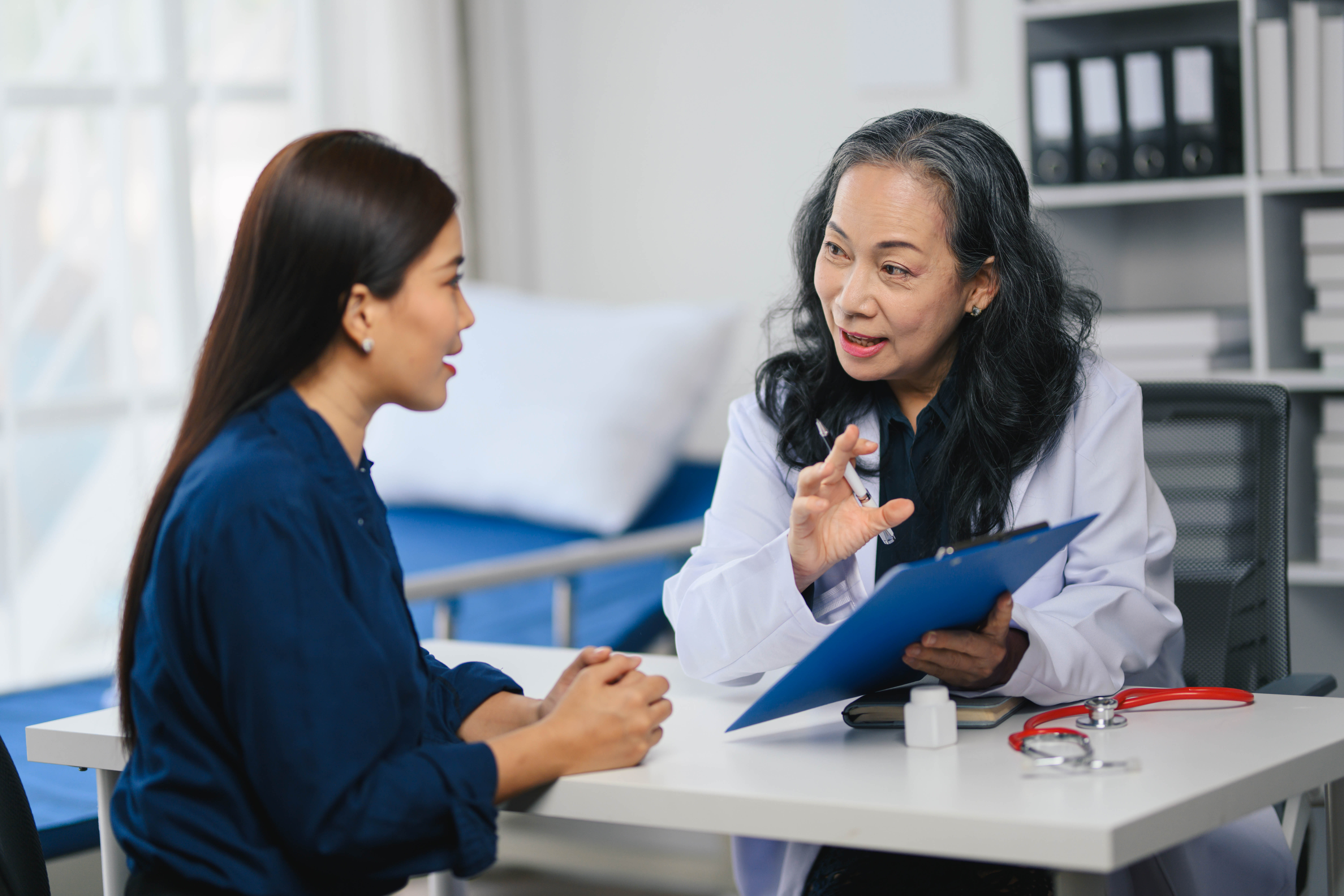 Filipino woman consults with a healthcare provider for a PCOS diagnosis