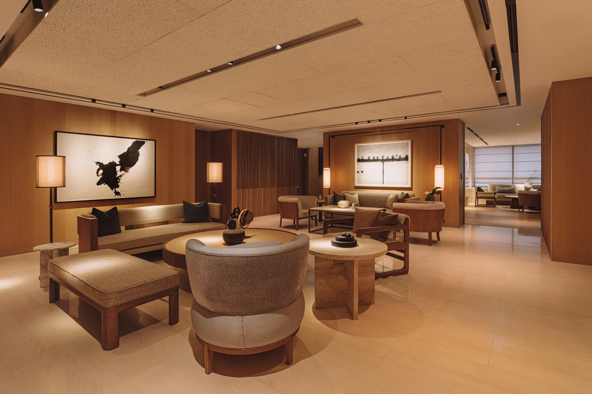 The first-floor PLAYA Lounge, with wood-panelled walls and lounge chairs
