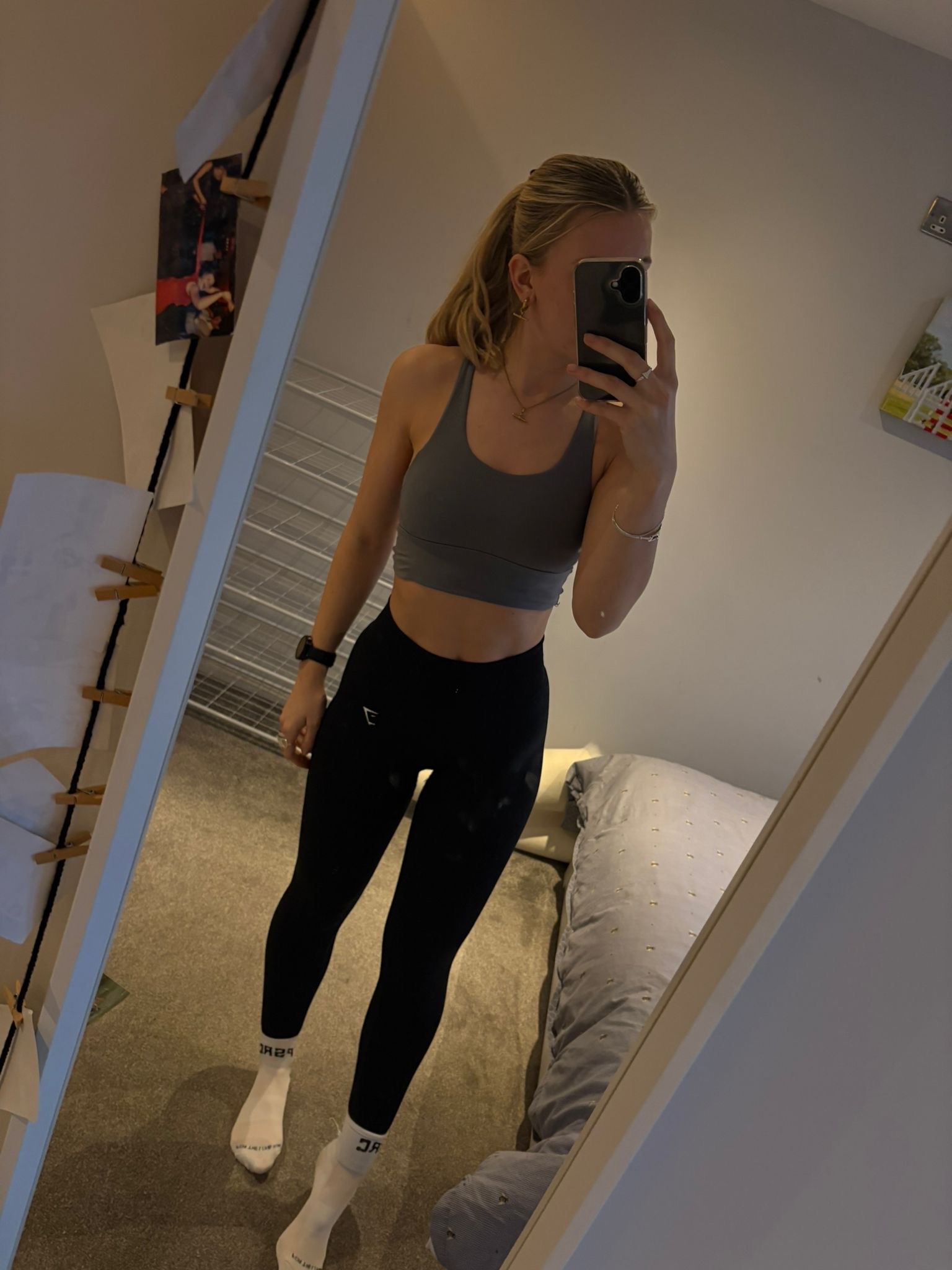 Sara is a client smiling to the camera happily