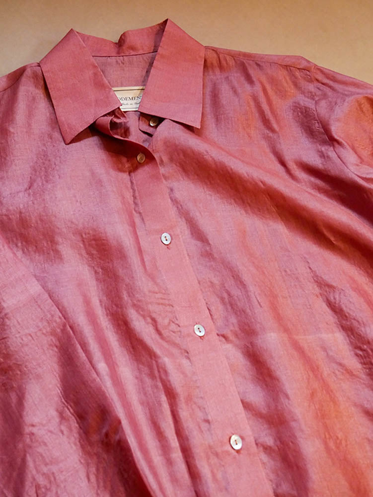 A relaxed co-ord set featuring a simple silk shirt, Designed for effortless wear