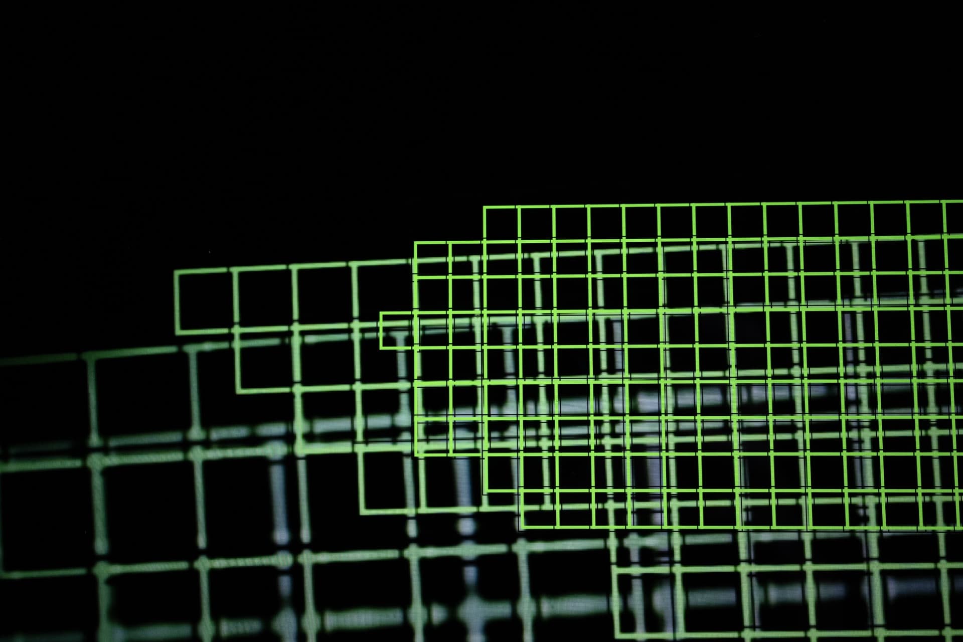 Horizontal bands of green autofocus grid extending across frame, perspective view showing recursive layering of detection zones with blue light artifacts