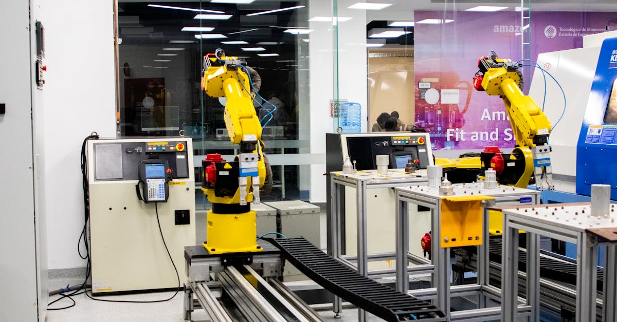 Robotic arms in action within a modern industrial control room setting, showcasing technology and pr