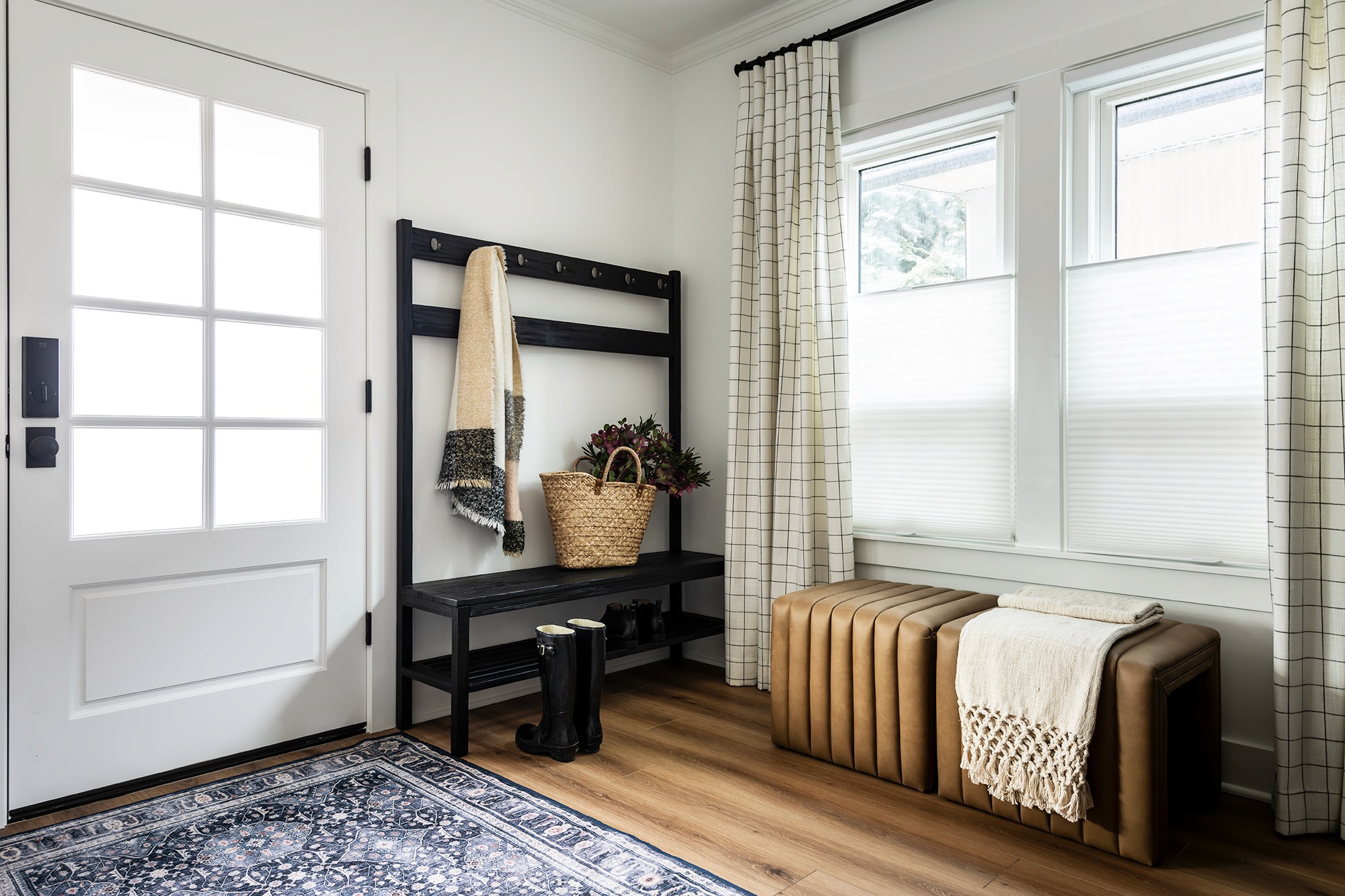 An Entry way organized for holiday decluttering in this Seattle, Washington Home by Professional Organizing firm, Elegant Simplicity