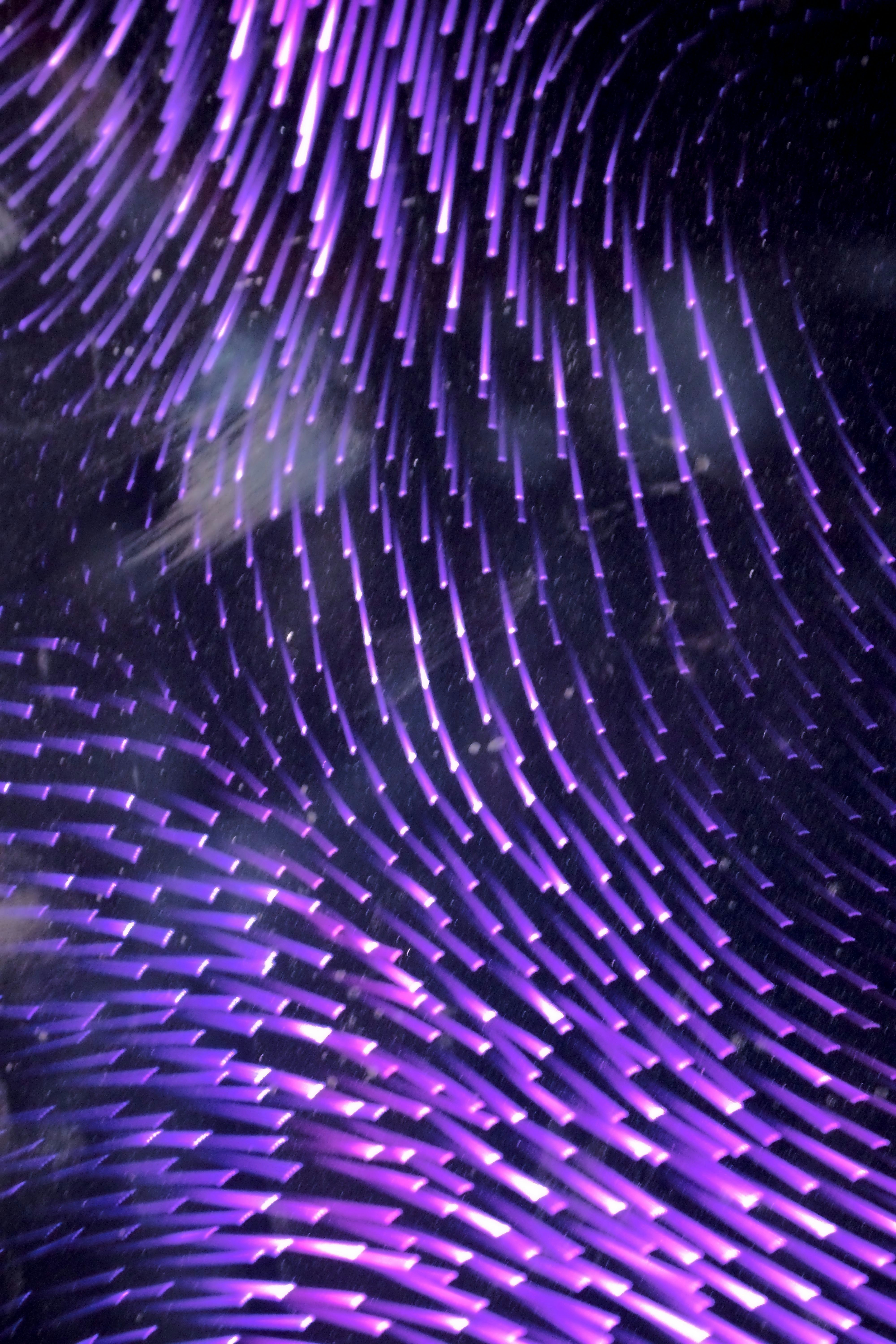 A close up of a cell phone with a pattern on it