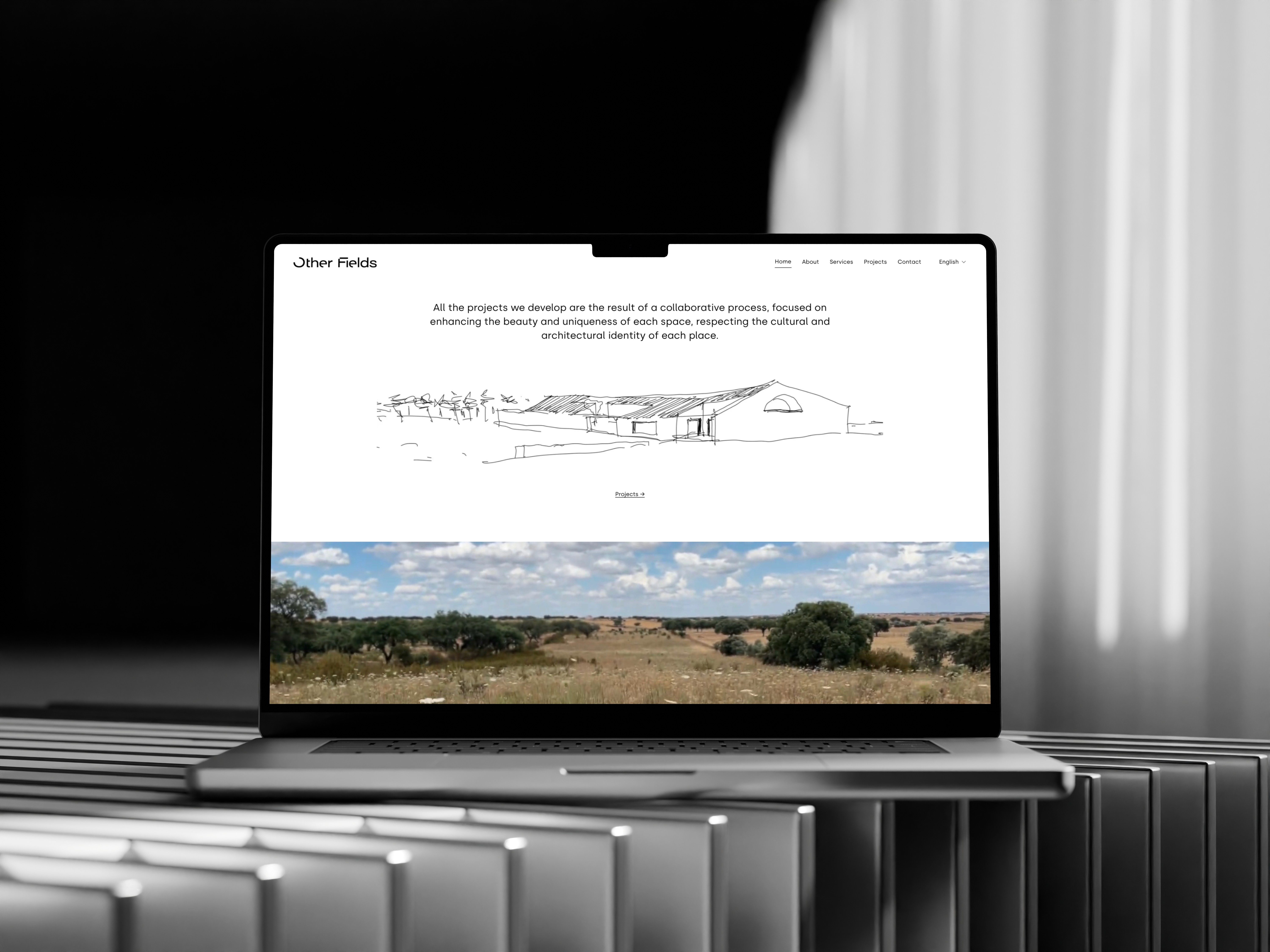 an image showing the website on a macbook of an architecture company