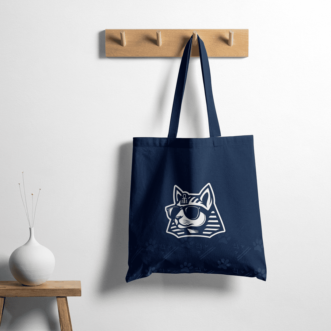TUT Designs tote bag featuring iconic pharaonic cat logo, stylish modern branding inspired by ancient Egypt.