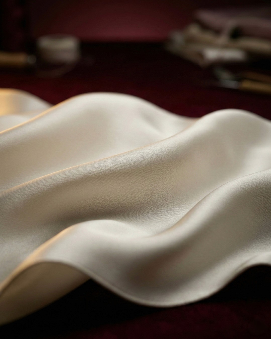 Contemporary interior with sculpted angled walls and a skylight filling the space with natural light.