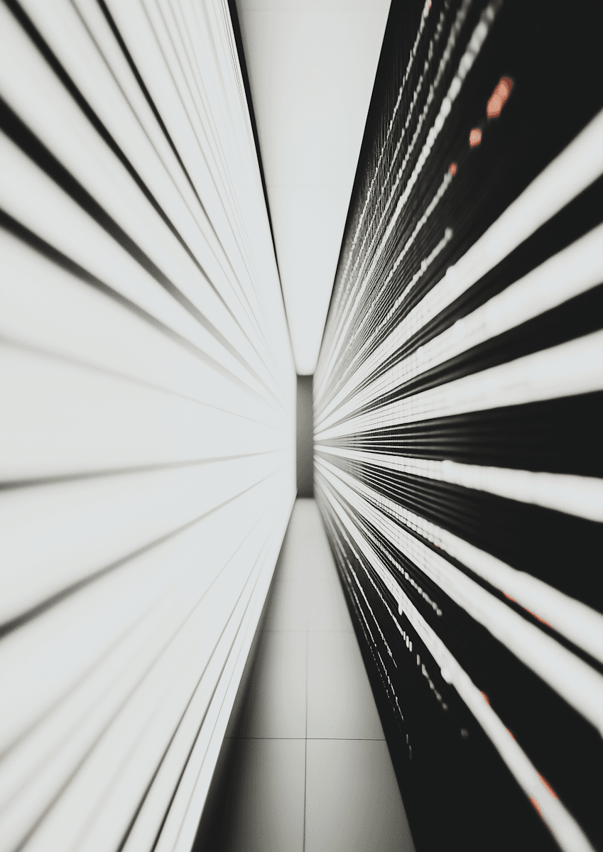 Abstract black and white lines converging to a point