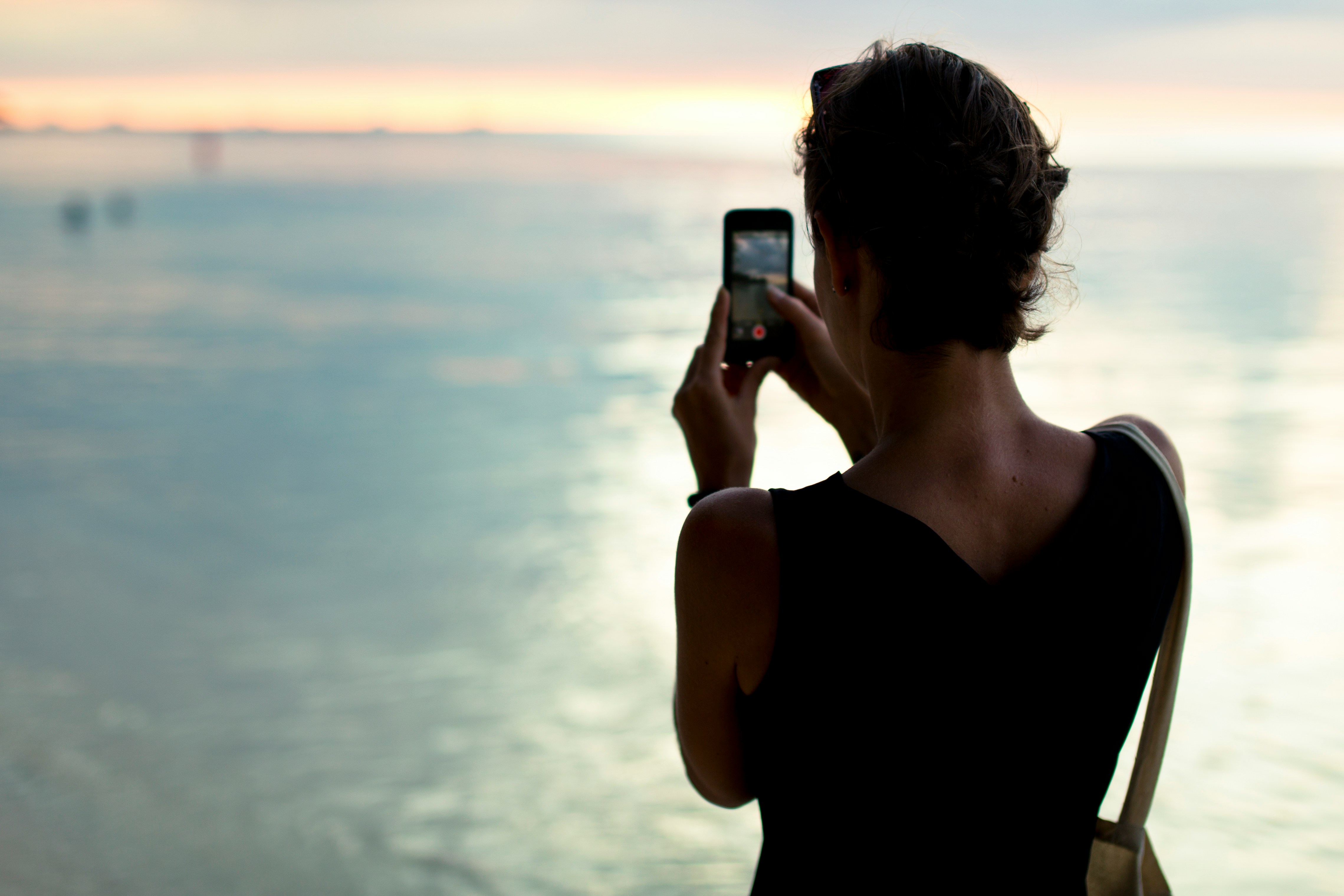 Lady clicking Picture- Fall Senior Picture Outfits