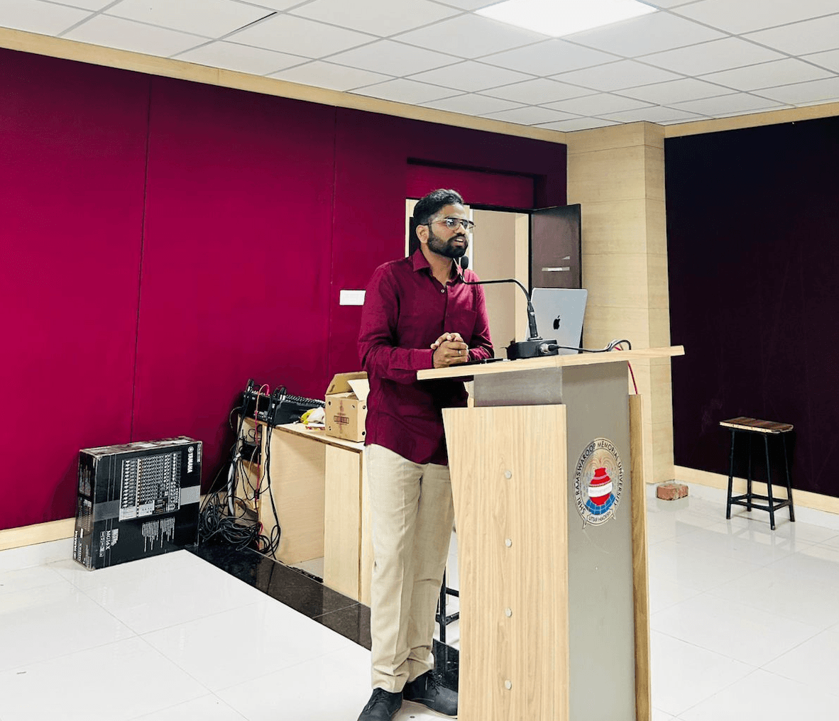 Bitcoin Bharat co-founder Aditya Ranjan speaking at a Bitcoin India Tour meetup in India