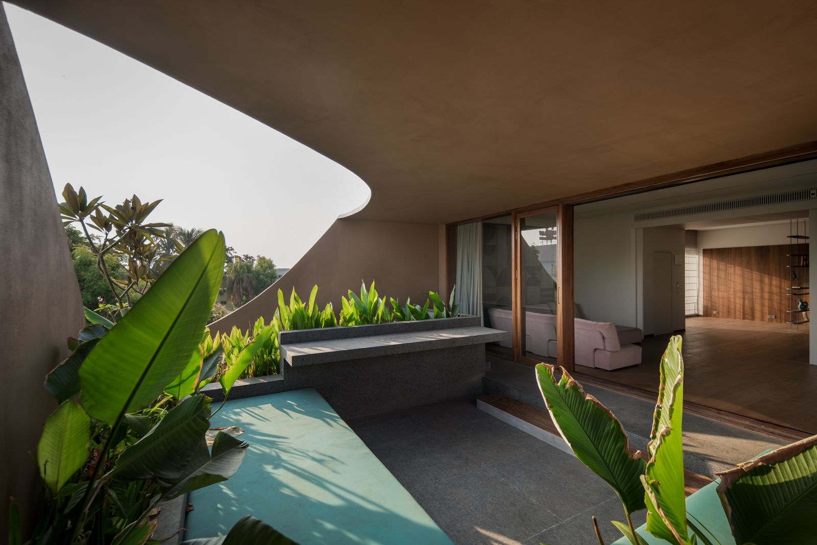 a dining room with a table and chairs