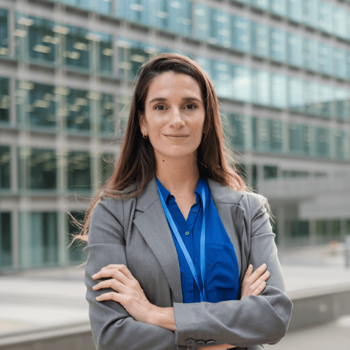 man standing beside wall