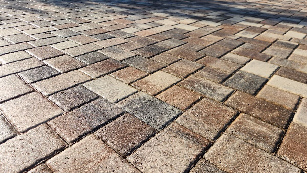 Close-up of paver joints after cleaning and joint sand stabilization