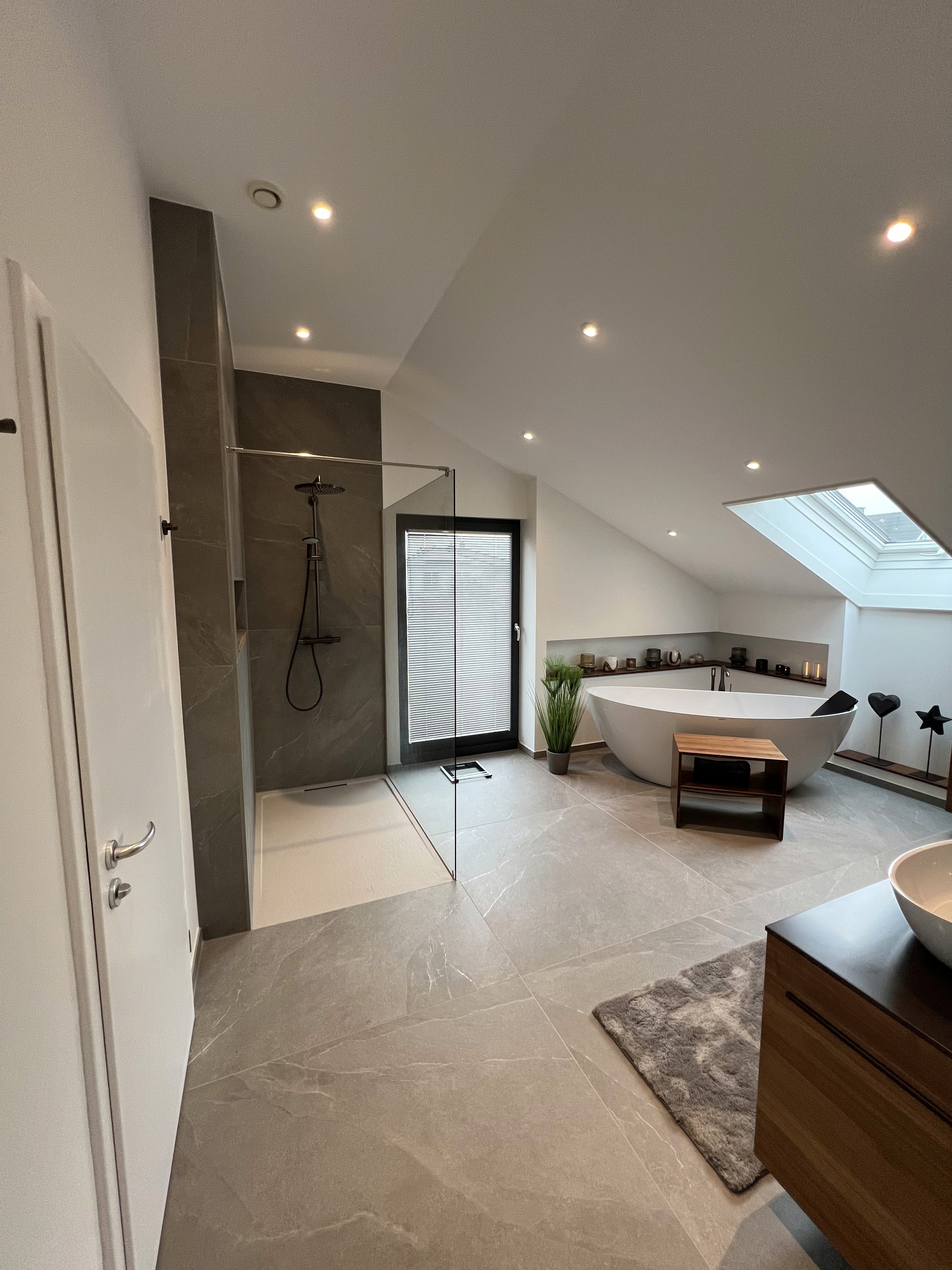 a black and white living room with a large tv