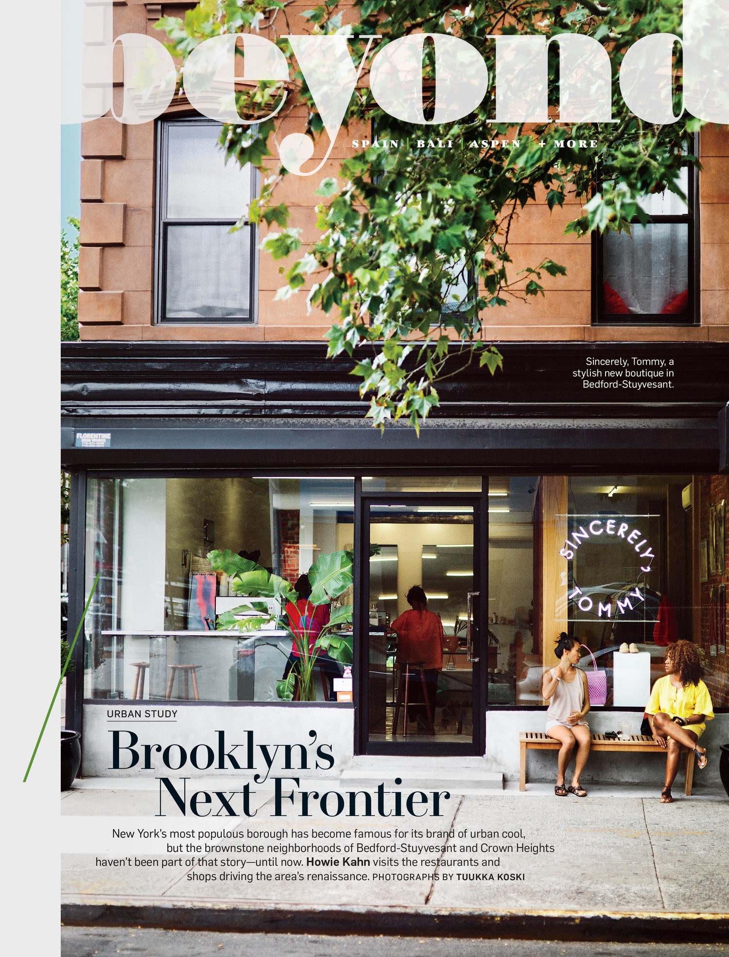 A magazine layout of a Brooklyn street scene. It features a clothing store with two people seating on a bench outside the storefront