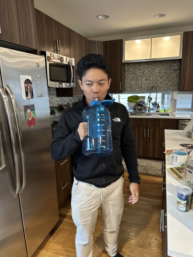 We work together in an apartment. Richard likes to keep himself hydrated.