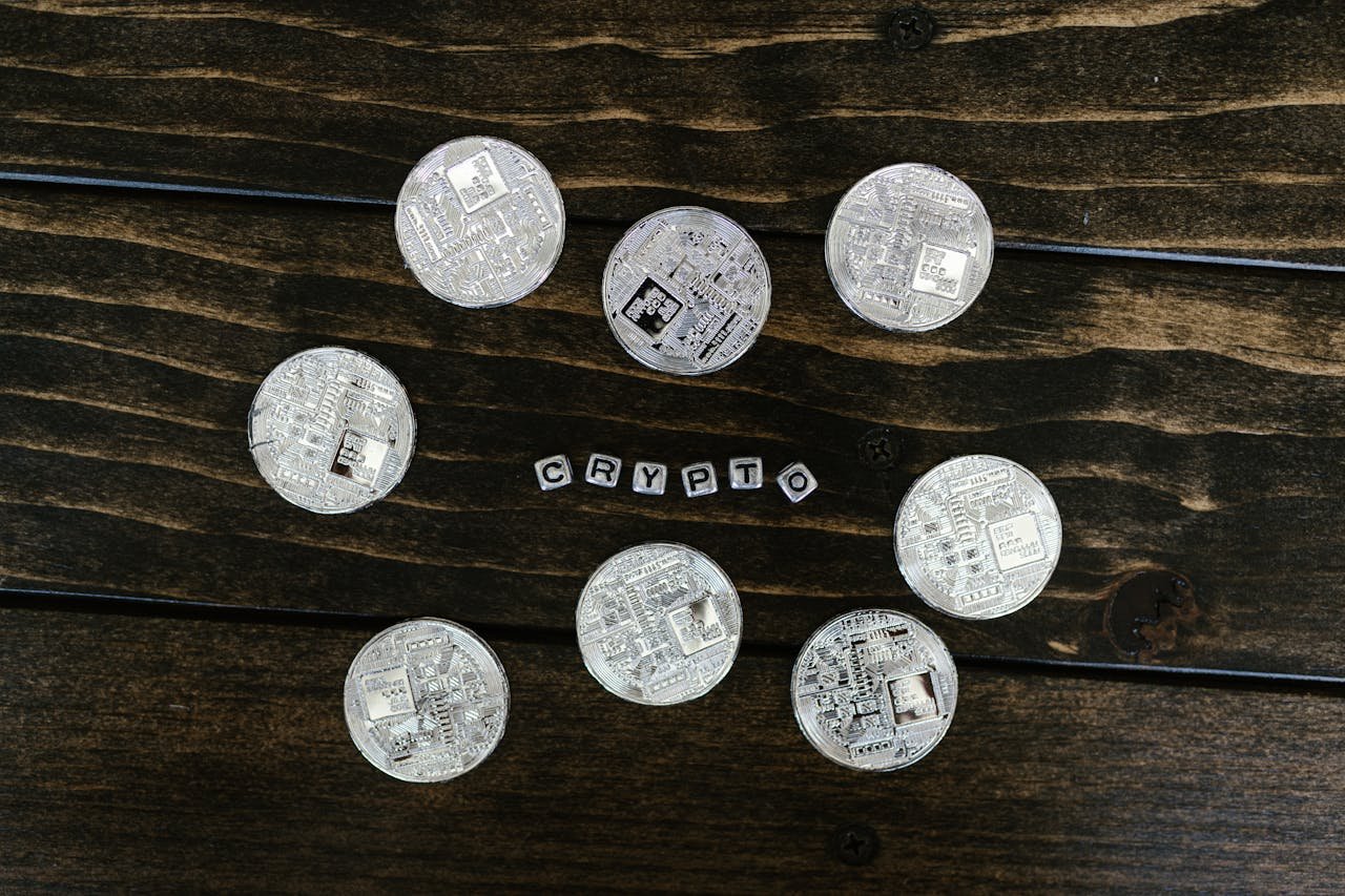 Physical coins with the word "Crypto" in the middle