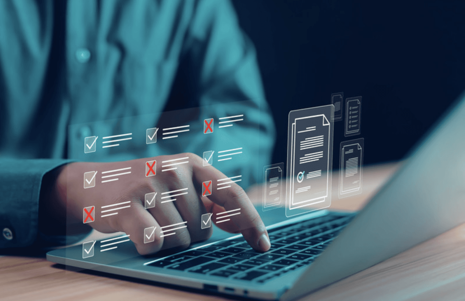 User typing on a laptop with a digital checklist interface showing completed and failed items, representing IT audits and system validation