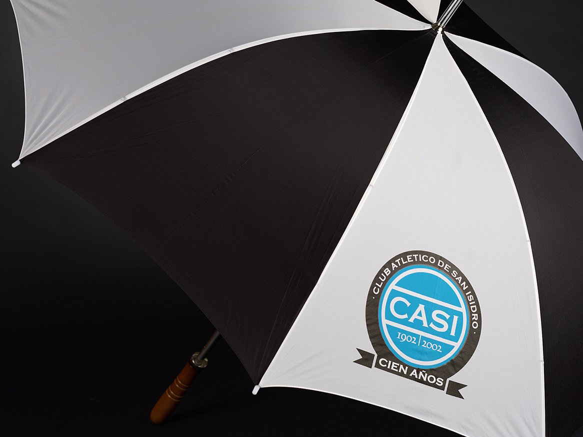 Rooftops of a coastal town with the sea in background