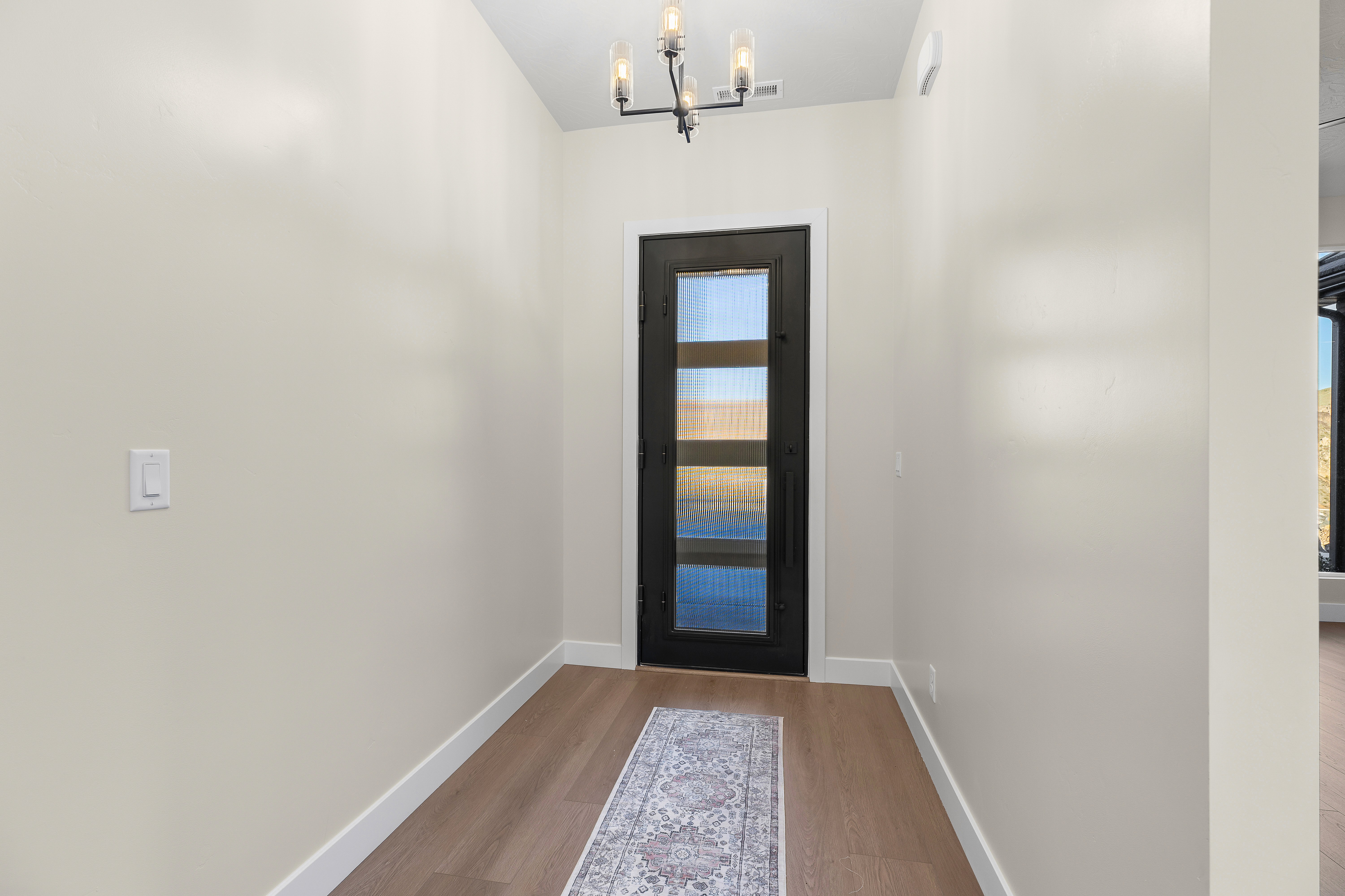 Entryway of a custom home in Hurricane Utah with natural light and welcoming design