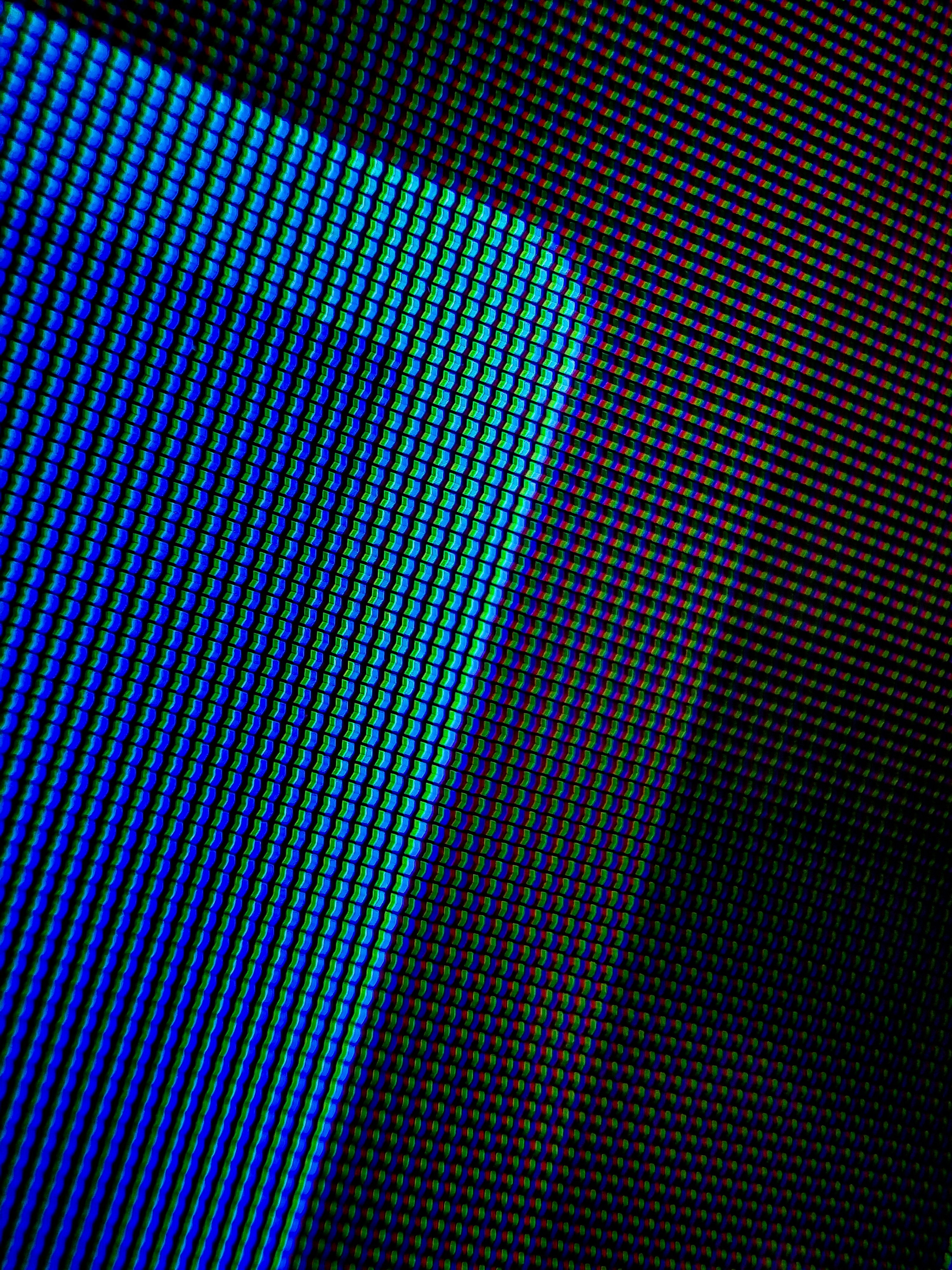 a close up of a television screen with different colors