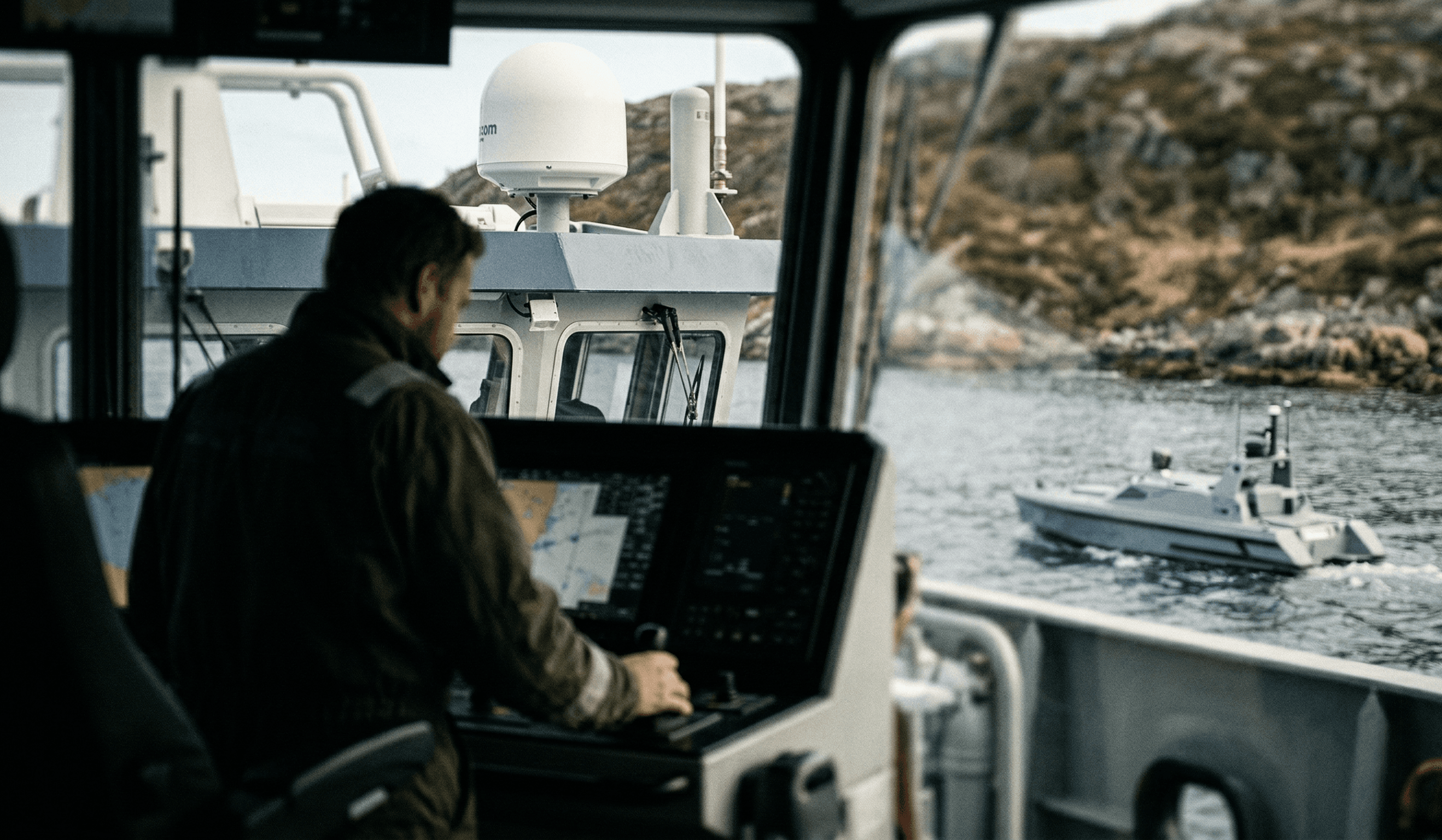 Operator overseeing autonomous vessel
