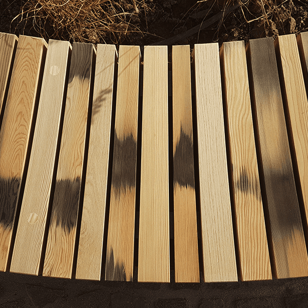 Outdoor furniture made from reclaimed natural timber material in collaboration with landscape architects