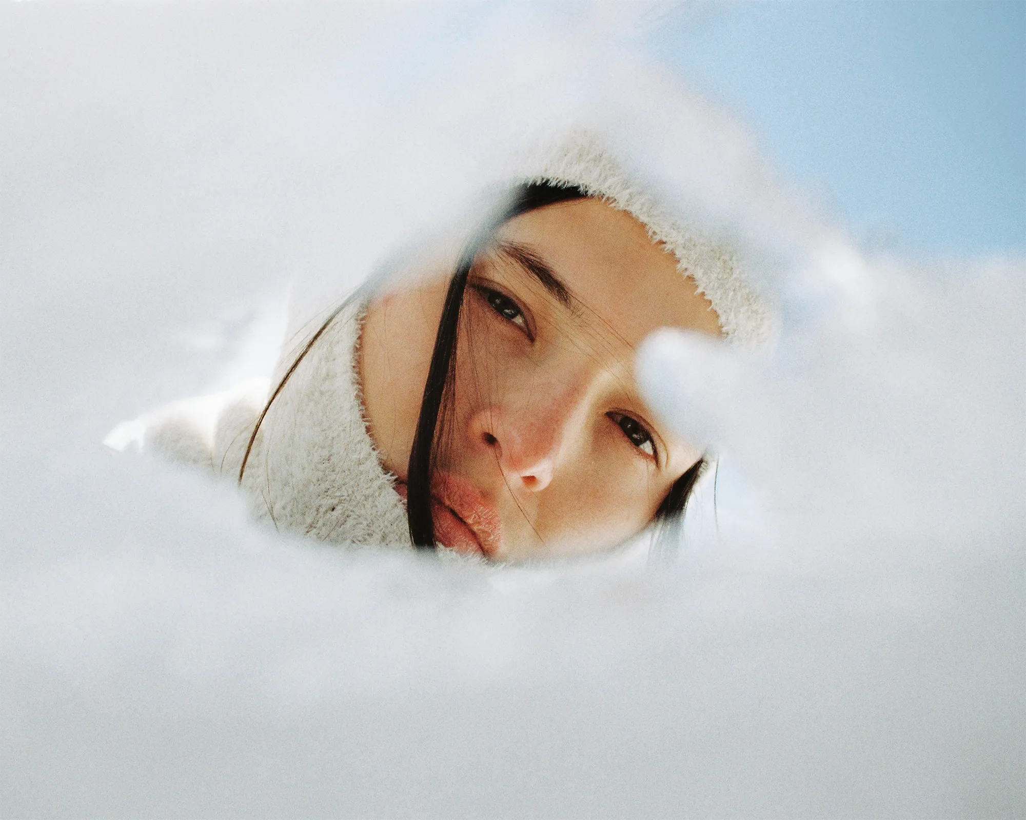 unconventional snowy portrait of a woman.