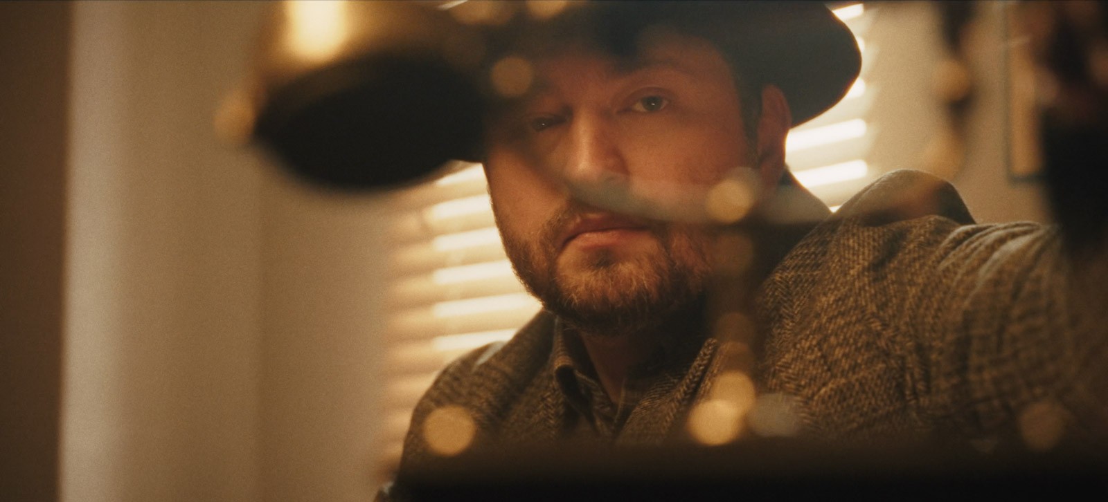 Drone shot of a running track at night