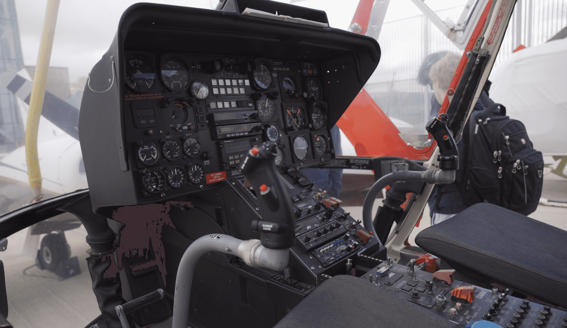 SHSM students from York Catholic and Waterloo Region school boards exploring aircraft and engines at Centennial College Downsview Campus