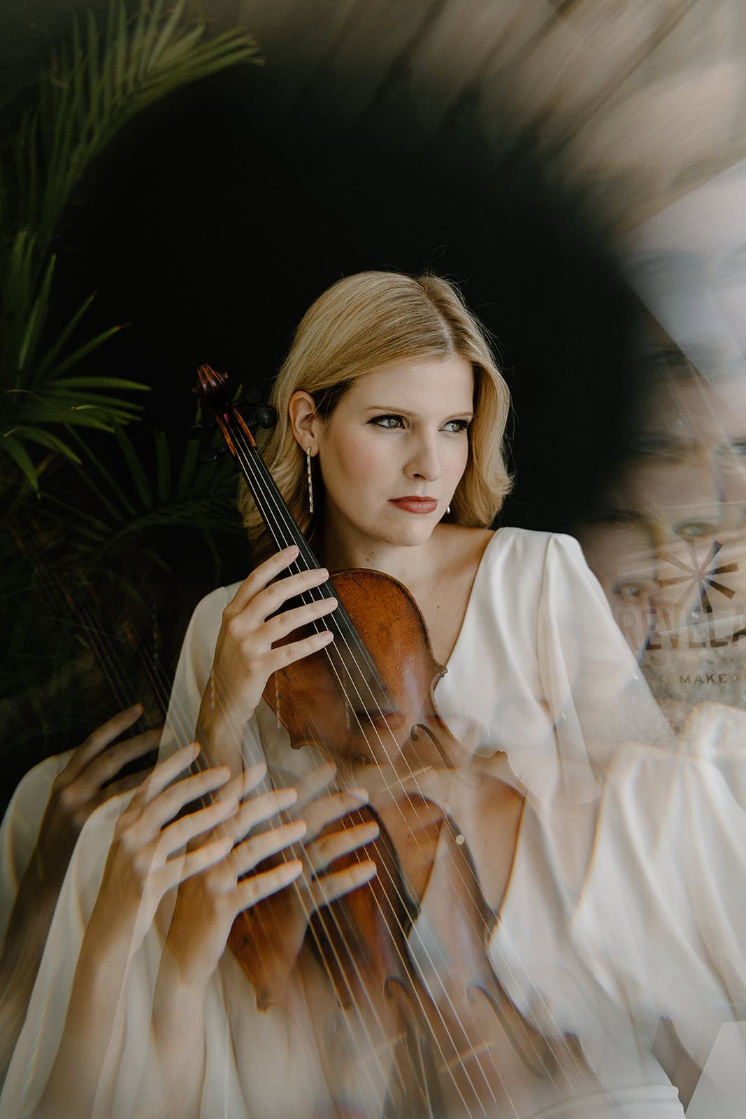 stylistic photo of woman with violin