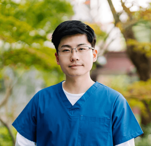 an older woman with white hair and a smile